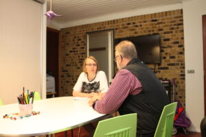 Jeg sidder i klinikken og taler med en person